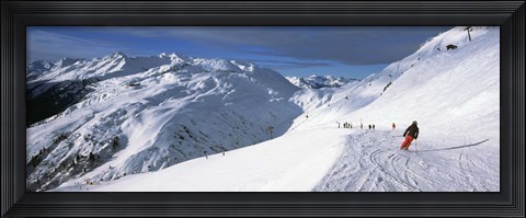 Framed Tourists skiing in a ski resort, Sankt Anton am Arlberg, Tyrol, Austria Print