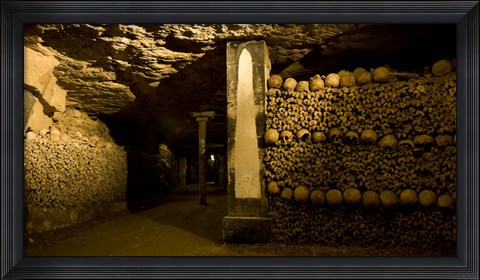 Framed Stacked bones in catacombs, Paris, Ile-de-France, France Print