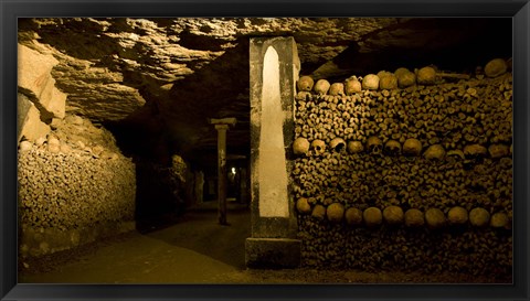 Framed Stacked bones in catacombs, Paris, Ile-de-France, France Print