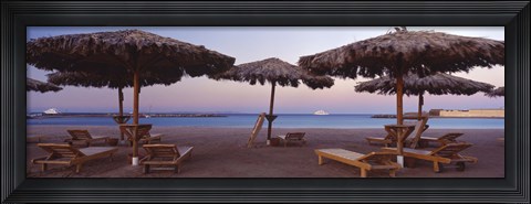 Framed Lounge chairs with sunshades on the beach, Hilton Resort, Hurghada, Egypt Print
