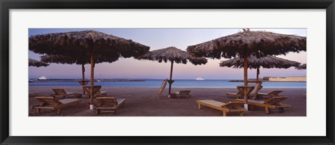 Framed Lounge chairs with sunshades on the beach, Hilton Resort, Hurghada, Egypt Print