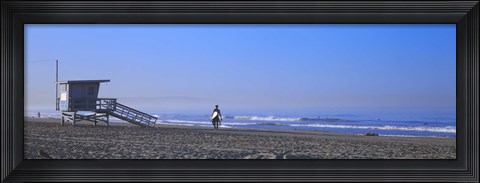 Framed Rear view of a surfer on the beach, Santa Monica, Los Angeles County, California, USA Print