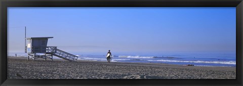 Framed Rear view of a surfer on the beach, Santa Monica, Los Angeles County, California, USA Print