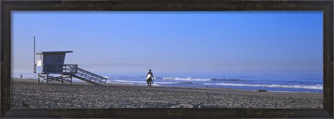 Framed Rear view of a surfer on the beach, Santa Monica, Los Angeles County, California, USA Print