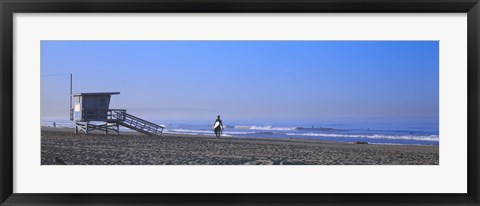 Framed Rear view of a surfer on the beach, Santa Monica, Los Angeles County, California, USA Print