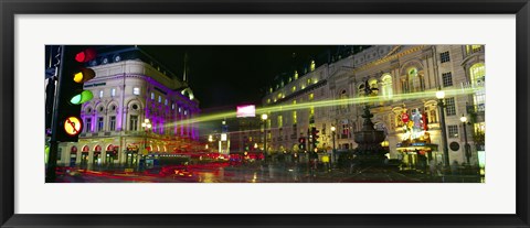 Framed Buildings lit up at night, Piccadilly Circus, London, England Print