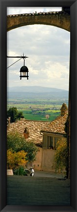 Framed Umbrian countryside viewed through an alleyway, Assisi, Perugia Province, Umbria, Italy Print