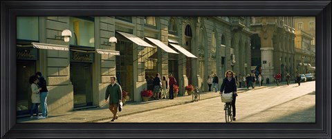 Framed Cyclists and pedestrians on a street, City Center, Florence, Tuscany, Italy Print