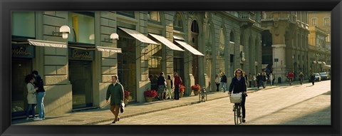 Framed Cyclists and pedestrians on a street, City Center, Florence, Tuscany, Italy Print