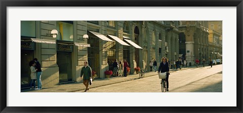 Framed Cyclists and pedestrians on a street, City Center, Florence, Tuscany, Italy Print