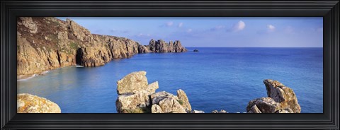 Framed Rock formations at seaside, Logan rock, Porthcurno Bay, Cornwall, England Print