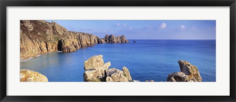 Framed Rock formations at seaside, Logan rock, Porthcurno Bay, Cornwall, England Print