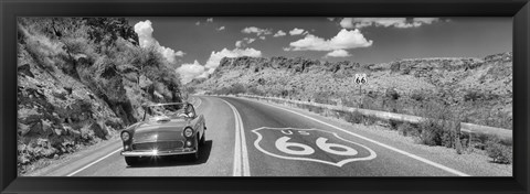 Framed Vintage car moving on Route 66 in black and white, Arizona Print