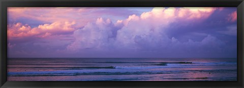 Framed Clouds over the sea at sunset Print