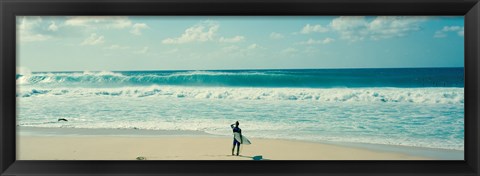 Framed Surfer standing on the beach, North Shore, Oahu, Hawaii Print