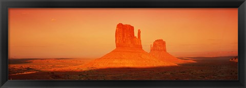 Framed Buttes at sunrise, The Mittens, Monument Valley Tribal Park, Monument Valley, Utah, USA Print