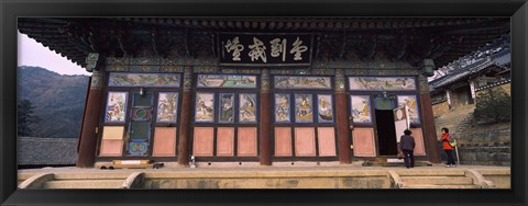 Framed Buddhist temple with a mountain range in the background, Kayasan Mountains, Haeinsa Temple, Gyeongsang Province, South Korea Print