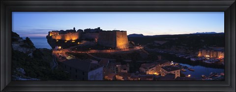 Framed Castle lit up at night, Bonifacio Harbour, Corsica, France Print