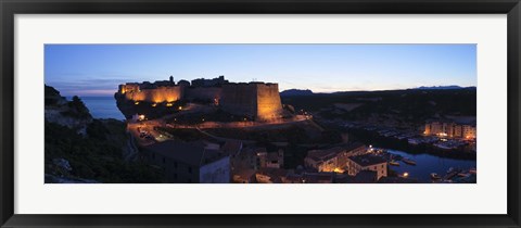 Framed Castle lit up at night, Bonifacio Harbour, Corsica, France Print