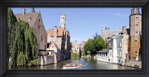 Framed Tourboat in a canal, Bruges, West Flanders, Belgium Print
