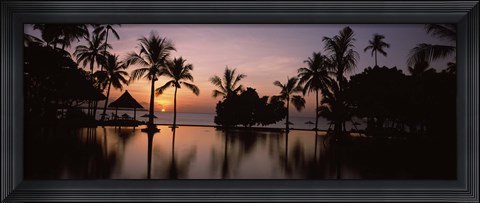 Framed Sunset over hotel pool, Lombok, West Nusa Tenggara, Indonesia Print