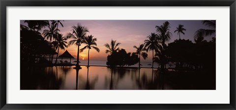 Framed Sunset over hotel pool, Lombok, West Nusa Tenggara, Indonesia Print