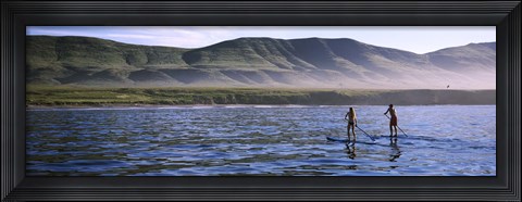 Framed Tourists paddleboarding in the pacific ocean, Santa Cruz Island, Santa Barbara County, California Print