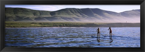 Framed Tourists paddleboarding in the pacific ocean, Santa Cruz Island, Santa Barbara County, California Print