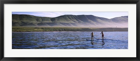 Framed Tourists paddleboarding in the pacific ocean, Santa Cruz Island, Santa Barbara County, California Print