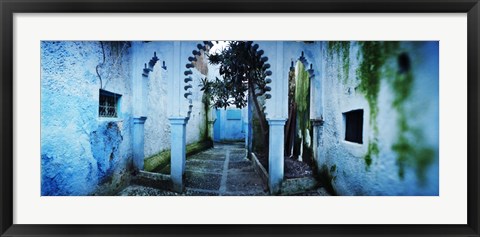 Framed Painted wall of medina, Chefchaouen, Morocco Print
