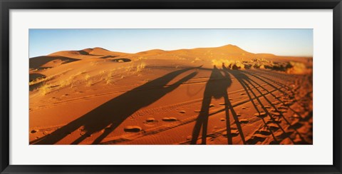 Framed Shadows of camel riders in the desert at sunset, Sahara Desert, Morocco Print