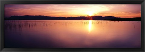 Framed Reflection of sun on water at dawn, Elephant Butte Lake, New Mexico, USA Print