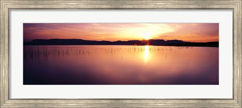 Framed Reflection of sun on water at dawn, Elephant Butte Lake, New Mexico, USA Print