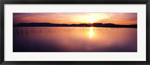 Framed Reflection of sun on water at dawn, Elephant Butte Lake, New Mexico, USA Print