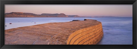 Framed Harbour wall at dusk, The Cobb, Lyme Regis, Dorset, England Print