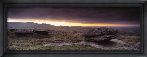 Framed Bright horizon with dark clouds from Higher Tor, Dartmoor, Devon, England Print