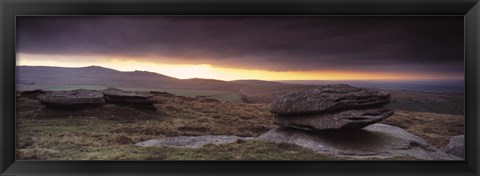 Framed Bright horizon with dark clouds from Higher Tor, Dartmoor, Devon, England Print