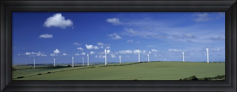 Framed Wind turbines in a farm, Newlyn Downs, Cornwall, England Print