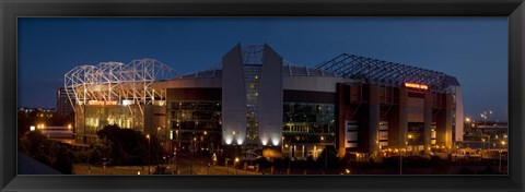 Framed Football stadium lit up at night, Old Trafford, Greater Manchester, England Print