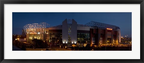 Framed Football stadium lit up at night, Old Trafford, Greater Manchester, England Print