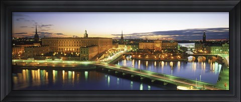 Framed Royal Palace and Parliament building lit up at dusk, Stockholm, Sweden Print