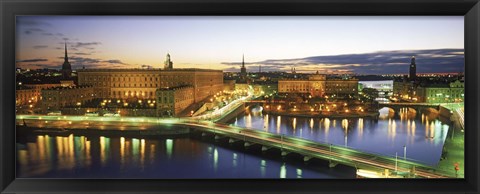 Framed Royal Palace and Parliament building lit up at dusk, Stockholm, Sweden Print