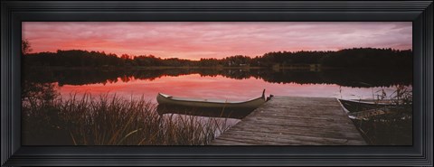 Framed Canoe tied to dock on a small lake at sunset, Sweden Print