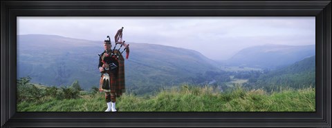 Framed Bagpiper at Loch Broom in Scottish highlands, Ross and Cromarty, Scotland Print