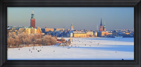 Framed People strolling across frozen Riddarfjarden, Riddarholmen, Stockholm, Sweden Print