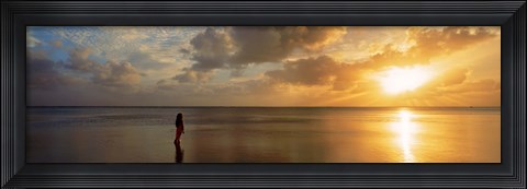 Framed Woman standing on sandbar looking at sunset, Aitutaki, Cook Islands Print