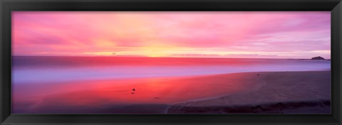 Framed Sunset light painting waves across sandy shore on beach, Laguna Beach, California, USA Print