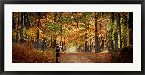 Framed Kid with backpack walking in fall colors Print