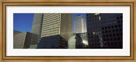 Framed Low angle view of towers, Canary Wharf Tower, South Quay, Isle of Dogs, London, England Print
