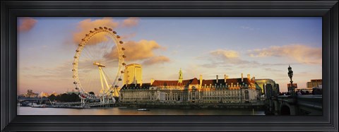 Framed Ferris wheel with buildings at waterfront, Millennium Wheel, London County Hall, Thames River, South Bank, London, England Print